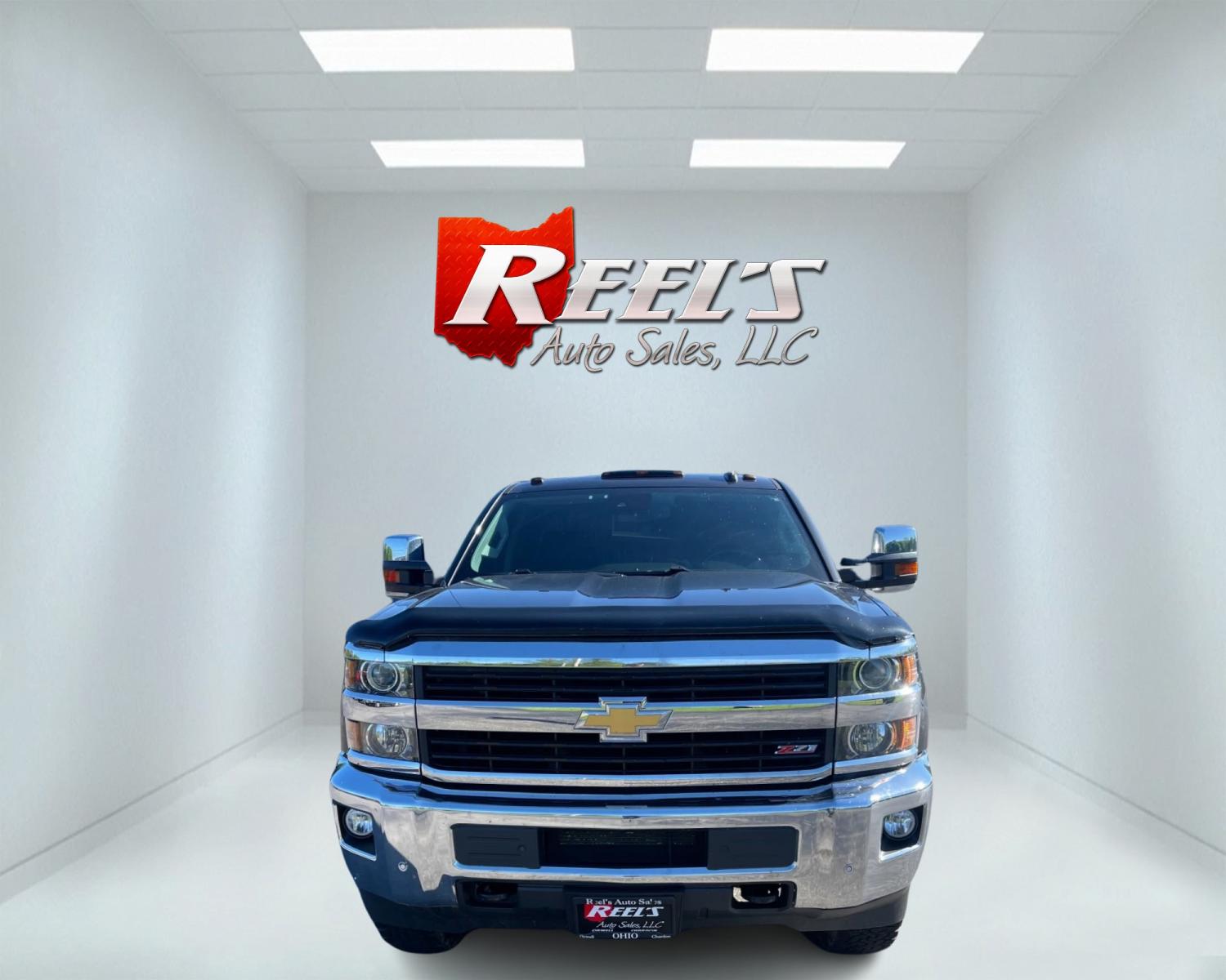 2016 Gray /Black Chevrolet Silverado 2500HD LTZ Z71 Double Cab 4WD (1GC2KWEG7GZ) with an 6.0L V8 OHV 16V FFV engine, 6-Speed Automatic transmission, located at 11115 Chardon Rd. , Chardon, OH, 44024, (440) 214-9705, 41.580246, -81.241943 - This 2016 Chevrolet Silverado 2500 HD LTZ Z71 Double Cab is a heavy-duty pickup truck that combines immense capability with premium features. Powered by a 6.0L Vortec V8 engine with flex-fuel capability and a 6-speed automatic transmission, it boasts a 13,200-pound towing capacity and a 2,796-pound - Photo #1